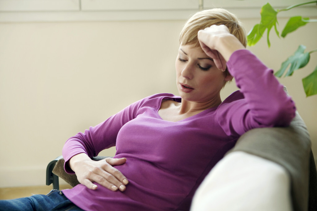 ABDOMINAL PAIN IN A WOMAN
